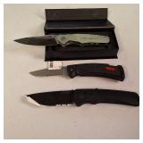 Lot of (3) Fixed Blade Tactical & Hunting Knives with Sheaths. One Buck brand