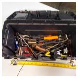 Plastic tool box chock full of tools