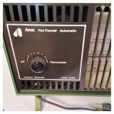 A vintage Arvin Industries Inc. heavy-duty utility heater