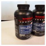 Lot of 4 1-pound containers of Winchester smokeless rifle powder, ideal for high-performance reloading.