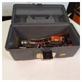 Plano 16-inch tool box with a variety of assorted hand tools and hardware.