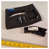 Taser C2 Defender professional-grade self-defense tool with its original carrying case and accessories