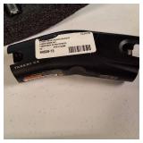 Taser C2 Defender professional-grade self-defense tool with its original carrying case and accessories