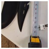 The BIG and the small.... a large, black survival-style knife and its matching nylon sheath :: a smaller folding pocket knife.