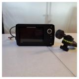 Humminbird HELIX 5 Sonar G2 fish finder unit along with its gimbal mounting hardware.