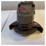 Milwaukee M18 FUEL 4-1/2" / 5" Grinder with a paddle switch.