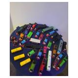 Bucket full of Thomas the Train pieces