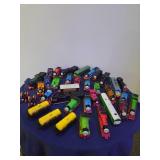 Bucket full of Thomas the Train pieces