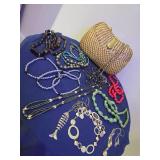 Wicker clutch with necklaces