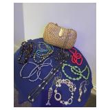 Wicker clutch with necklaces