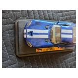 Vintage variety of toy cars, Racing ornaments, Hotwheels, Chevy Bag. Lot of 15 pieces