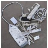 LOT OF EXTENSION CORDS AND SURGE PROTECTERS