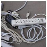 LOT OF EXTENSION CORDS AND SURGE PROTECTERS
