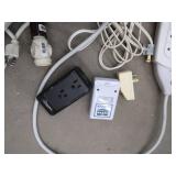 LOT OF EXTENSION CORDS AND SURGE PROTECTERS