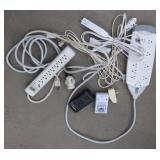 LOT OF EXTENSION CORDS AND SURGE PROTECTERS