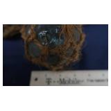 4 SMALL JAPENESE GLASS FISHING FLOATS, WITH 4 BOTTLES OF FIRE BRINE