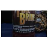 4 SMALL JAPENESE GLASS FISHING FLOATS, WITH 4 BOTTLES OF FIRE BRINE