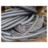 3 DIFFERENT SIZES OF CLAD CABLE (ELECTRICAL CONDUIT) AND YELLOW WIRES