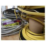 3 DIFFERENT SIZES OF CLAD CABLE (ELECTRICAL CONDUIT) AND YELLOW WIRES