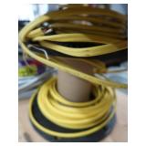 3 DIFFERENT SIZES OF CLAD CABLE (ELECTRICAL CONDUIT) AND YELLOW WIRES