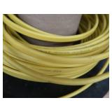 3 DIFFERENT SIZES OF CLAD CABLE (ELECTRICAL CONDUIT) AND YELLOW WIRES