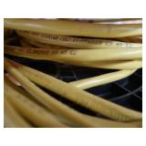 3 DIFFERENT SIZES OF CLAD CABLE (ELECTRICAL CONDUIT) AND YELLOW WIRES