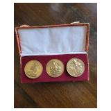 Three Buddhist Medallions in Pink Brocade Box with White Satin Liner (Three-Coin Set)
