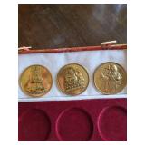 Three Buddhist Medallions in Pink Brocade Box with White Satin Liner (Three-Coin Set)