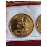 Three Buddhist Medallions in Pink Brocade Box with White Satin Liner (Three-Coin Set)