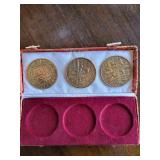 Three Buddhist Medallions in Pink Brocade Box with White Satin Liner (Three-Coin Set)
