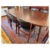 Beautiful Danish Rosewood Mid Century Modern Oval Dining Table & 8 Wood Chairs with Black Cushioned Seats and Backs