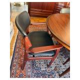 Beautiful Danish Rosewood Mid Century Modern Oval Dining Table & 8 Wood Chairs with Black Cushioned Seats and Backs