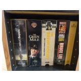 Collection of DVDs and VHS Tapes with Tower Cabinet