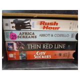 Collection of DVDs and VHS Tapes with Tower Cabinet