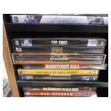 Collection of DVDs and VHS Tapes with Tower Cabinet