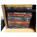 Collection of DVDs and VHS Tapes with Tower Cabinet