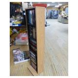 Collection of DVDs and VHS Tapes with Tower Cabinet