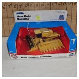 New Holland Combine and 1909 Harley Davidson