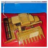 New Holland Combine and 1909 Harley Davidson