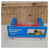 New Holland Combine and 1909 Harley Davidson