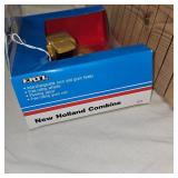 New Holland Combine and 1909 Harley Davidson