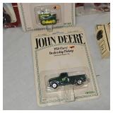 Six Small Die Cast Trucks