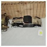 King of the Road Wind Up Car and 1931