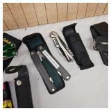 4 Multi Tool Knives and one pepper spray