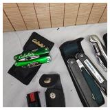 4 Multi Tool Knives and one pepper spray