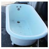 Vintage cast iron clawfoot bathtub, featuring a white porcelain enamel all over. 54" Long X 25.5" Wide X 23" High