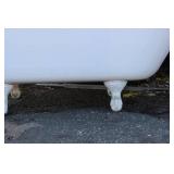 Vintage cast iron clawfoot bathtub, featuring a white porcelain enamel all over. 54" Long X 25.5" Wide X 23" High
