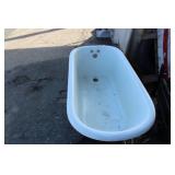Vintage cast iron clawfoot bathtub, featuring a white porcelain enamel all over. 54" Long X 25.5" Wide X 23" High