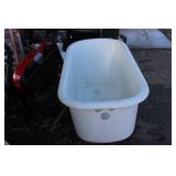 Vintage cast iron clawfoot bathtub, featuring a white porcelain enamel all over. 54" Long X 25.5" Wide X 23" High