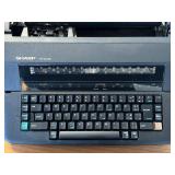 LL - Sharp PA-3100II Portable Electronic Typewriter